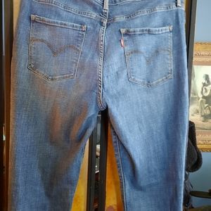 Levi's 311 Shaping Skinny Mid rise medium wash
